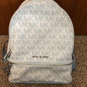Selling baby blue and white Michael Kors backpack